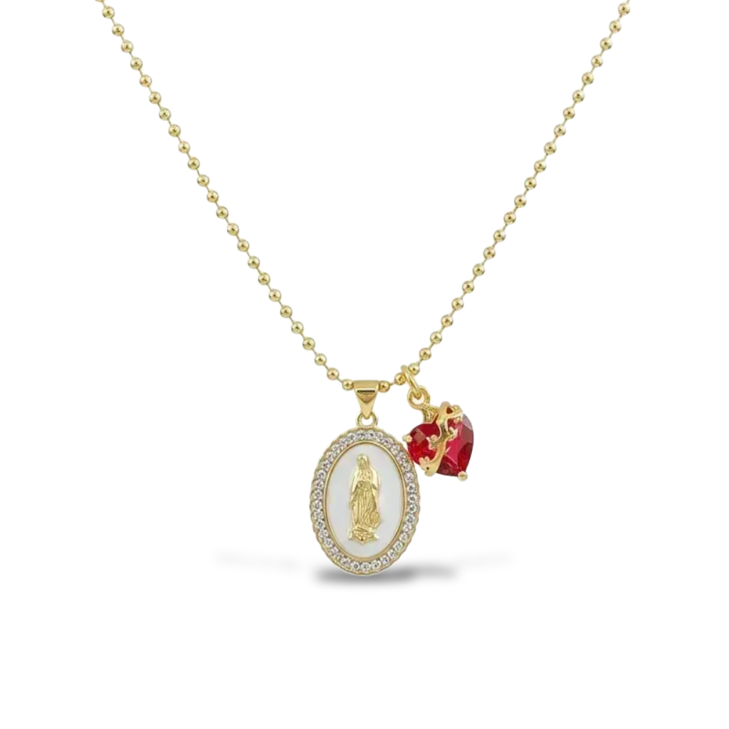 Gold necklace with a religious pendant and red heart charm on a white background, branded 'Guided by Cross'.