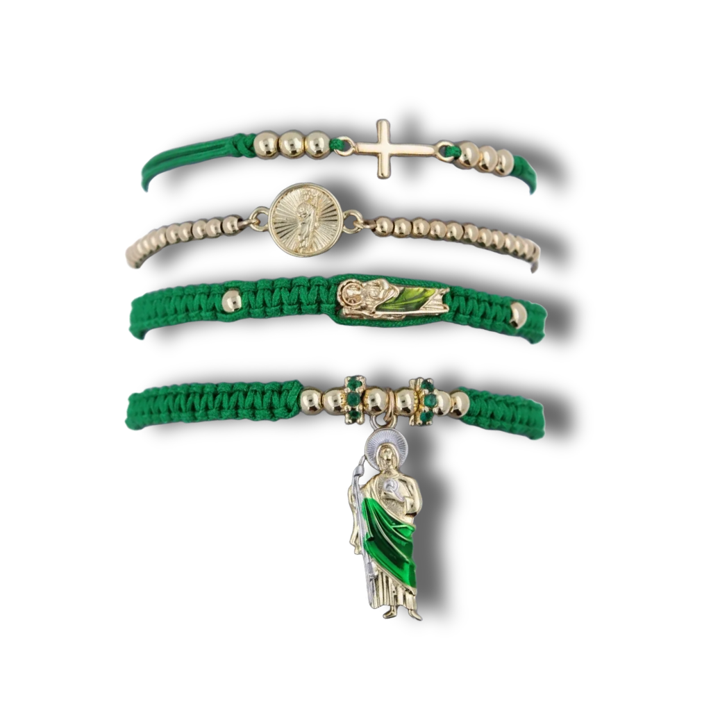 Set of green and gold bracelets with religious charms on a white background