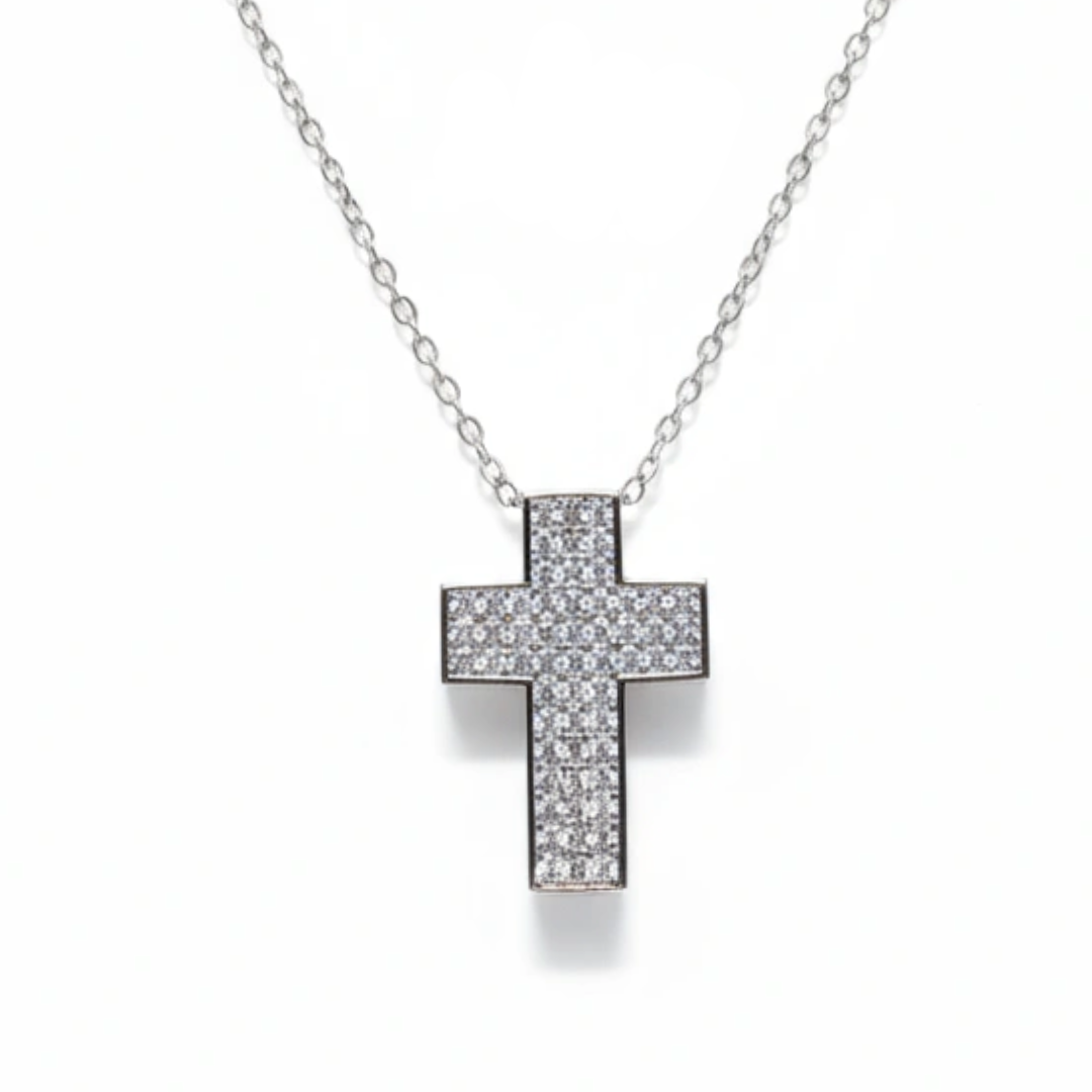 Silver cross necklace with clear stones on a white background, branded 'Guided by Cross'.