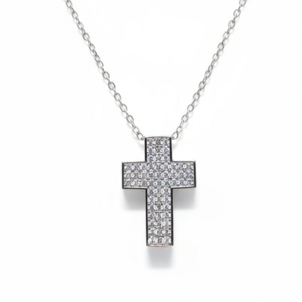 Silver cross necklace with clear stones on a white background, branded 'Guided by Cross'.