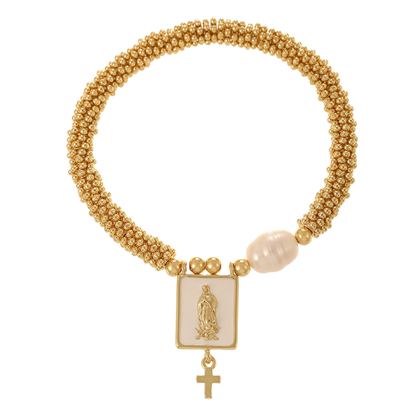 Gold beaded bracelet with a religious charm on a white background