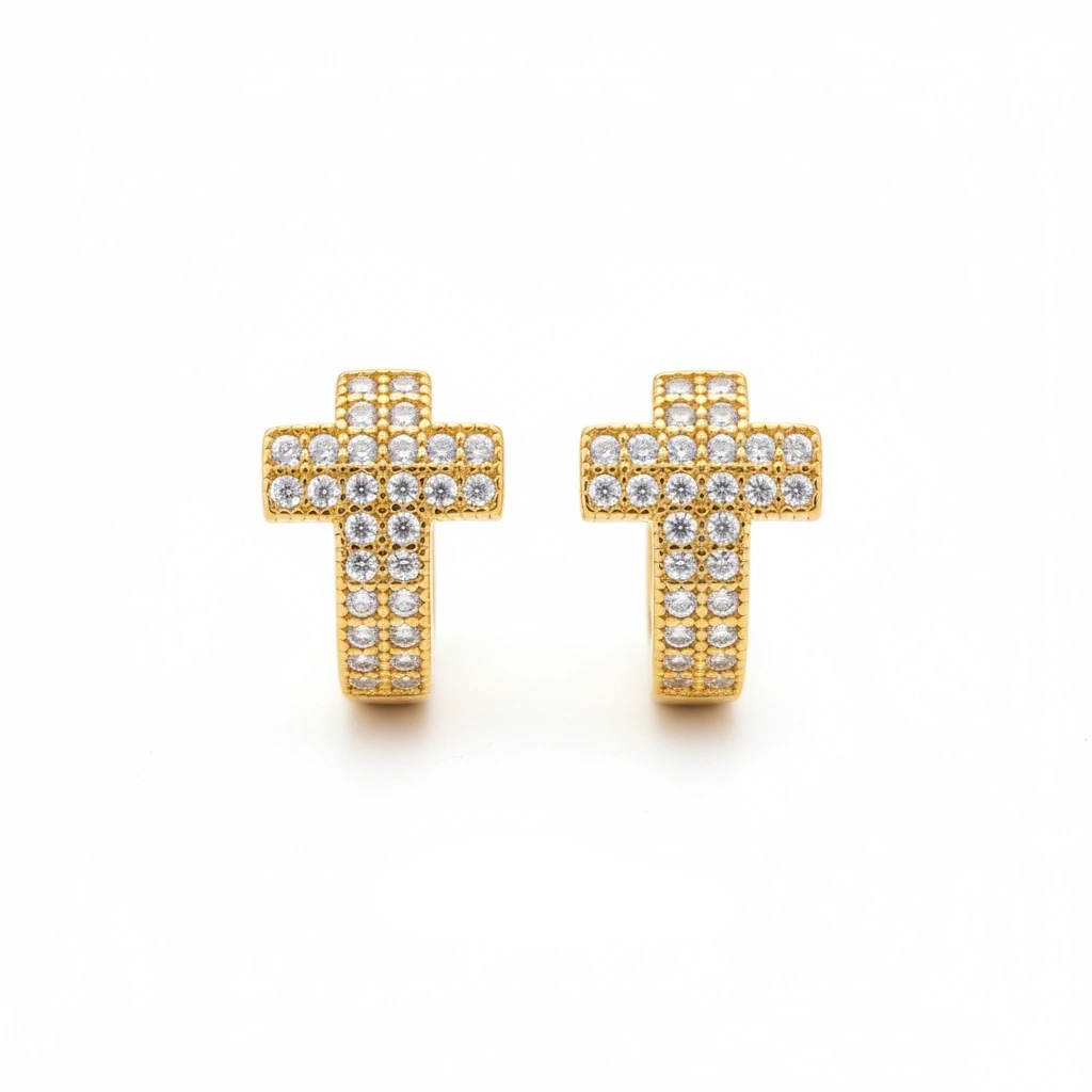 Gold cross earrings with clear stones on a white background, featuring 'Guided by Cross' branding.