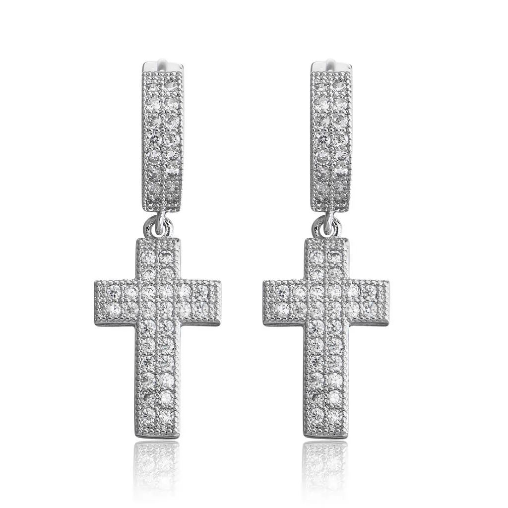 Silver cross earrings with clear stones on a white background, branded 'Guided by Cross'.
