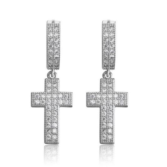 Silver cross earrings with clear stones on a white background, branded 'Guided by Cross'.