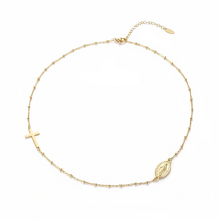 Gold necklace with religious symbols on a white background, featuring the brand 'Guided by Cross'.