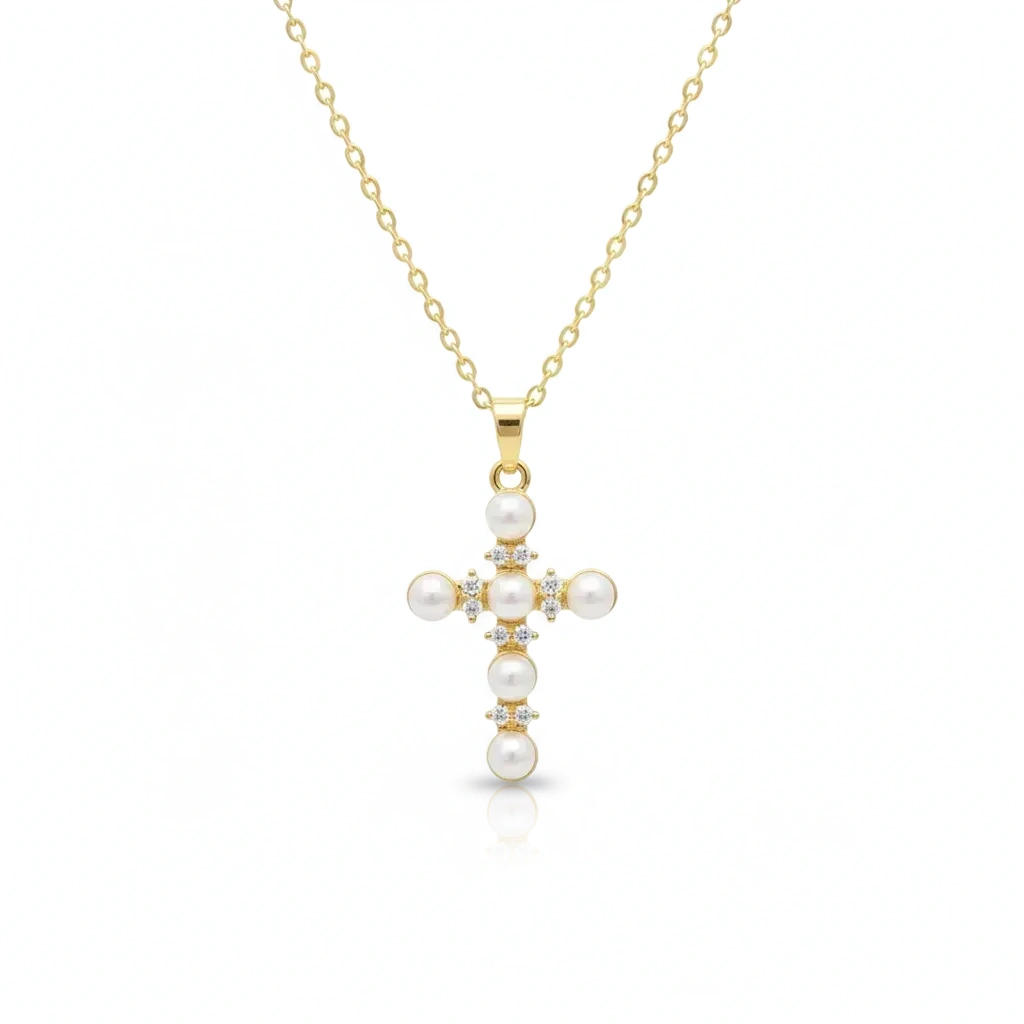 Gold necklace with a cross pendant featuring pearls on a white background, branded 'Guided by Cross'.