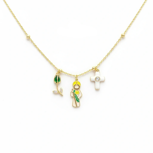 Gold necklace with three charms on a white background, featuring 'Guided by Cross' branding.