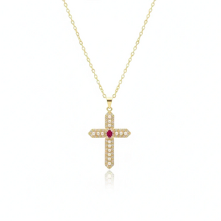 Gold cross necklace with a red gemstone on a white background, branded 'Guided by Cross'.