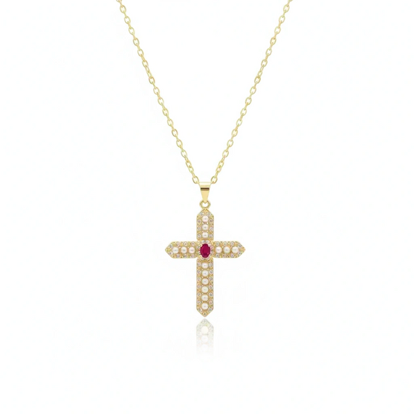 Gold cross necklace with a red gemstone on a white background, branded 'Guided by Cross'.