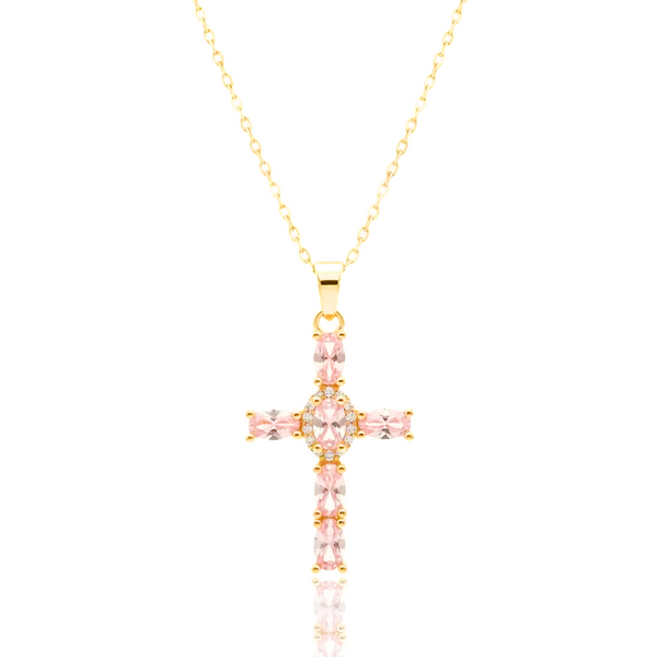 Gold cross necklace with pink gemstones on a white background, featuring 'Guided by Cross' branding.