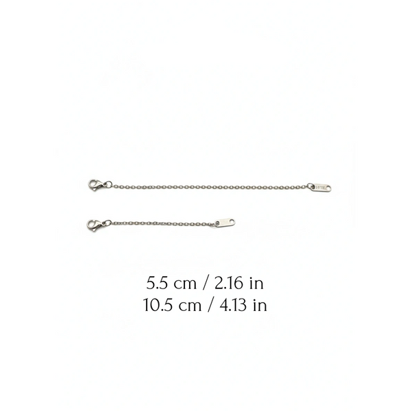 Two silver chain extensions with measurements on a white background, branded 'Guided by Cross'.